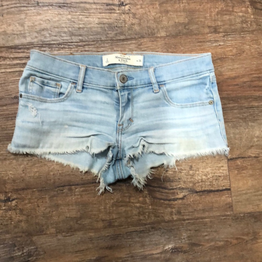 Light jean, fringed bottom shorts